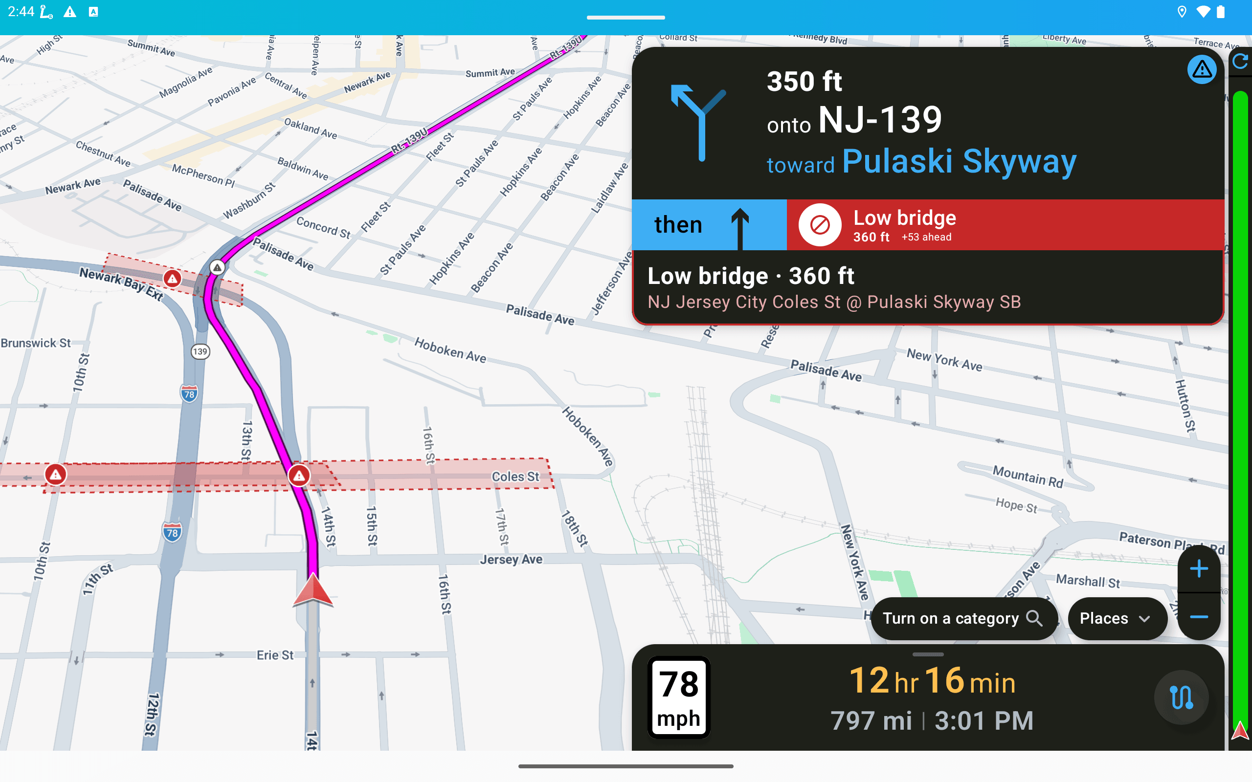 What the driver sees: the next maneuver, the low bridge alert with its distance, the route.